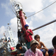 DATE IMPORTED:February 23, 2010Migrant workers from Myanmar clean a fishing net as they sail out of the port of Mahachai, near Bangkok February 23, 2010. Migrant workers in Thailand face extortion, arbitrary detention, forced labour and physical abuse, sometimes at the hand of authorities amidst a pervasive climate of impunity, a leading rights group said on Tuesday. REUTERS/Damir Sagolj